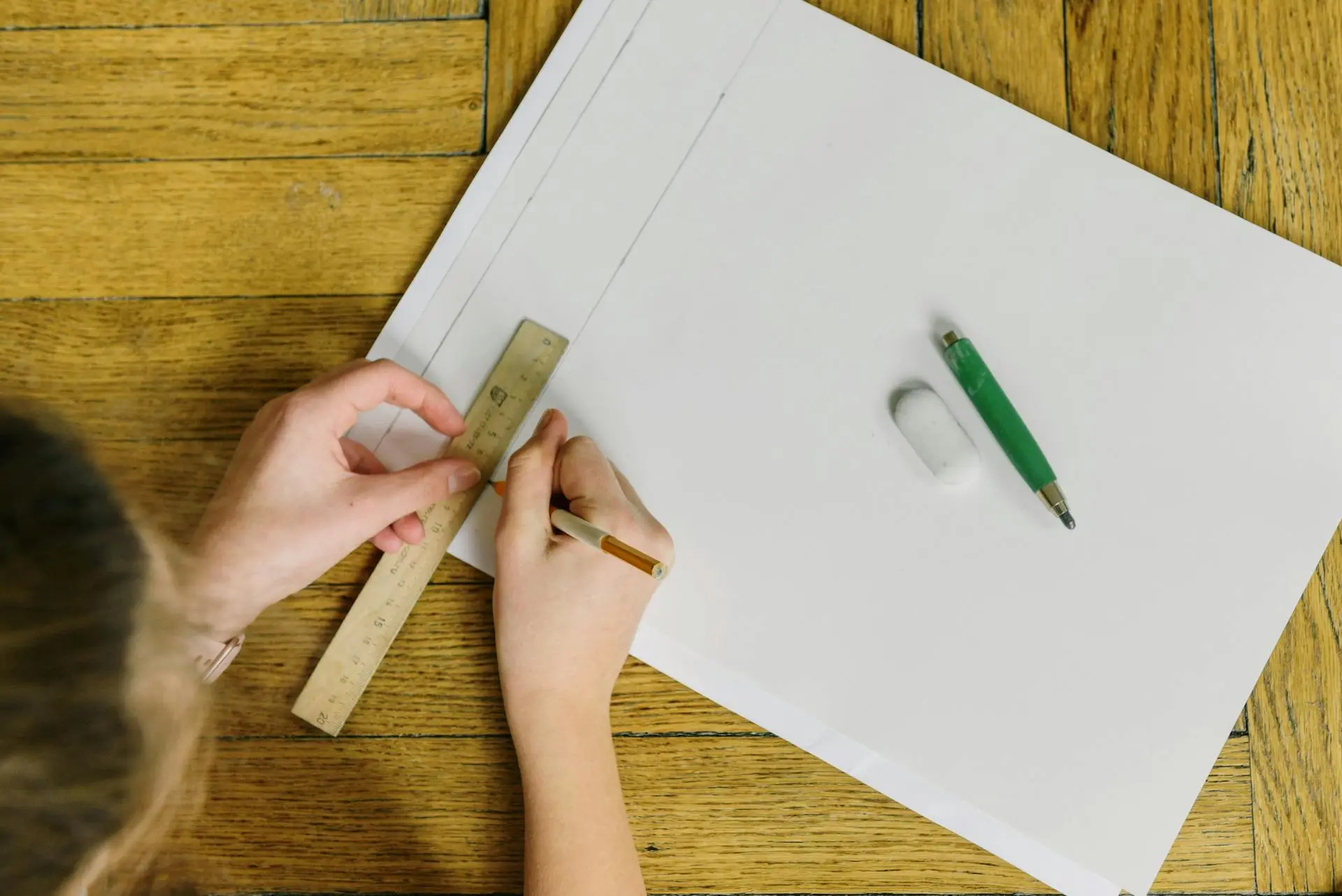 A4 paper size being measured with ruler showing paper dimensions for printing
