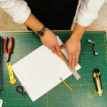 A3 paper size being measured and cut on workspace showing large paper dimensions