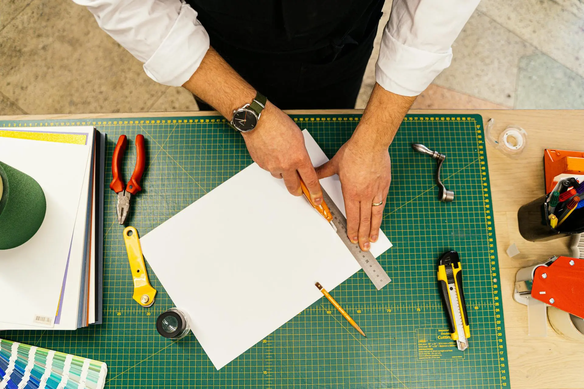 A3 paper size being measured and cut on workspace showing large paper dimensions