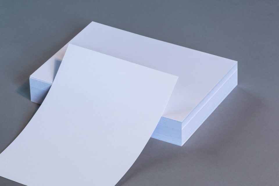70gsm vs 80gsm paper used in office document stacks for high volume printing.