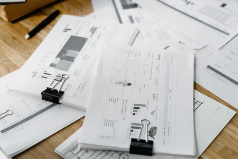 a4 paper price in singapore shown through printed office documents and paper stack for business reporting