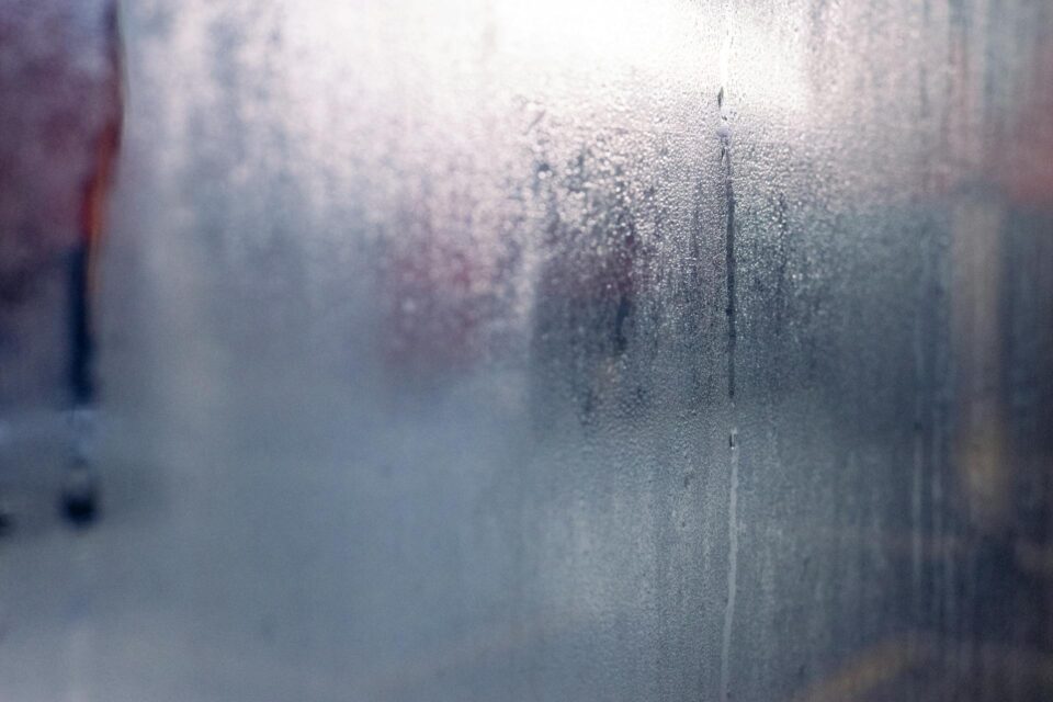how does a dehumidifier work to reduce condensation on windows in humid environments