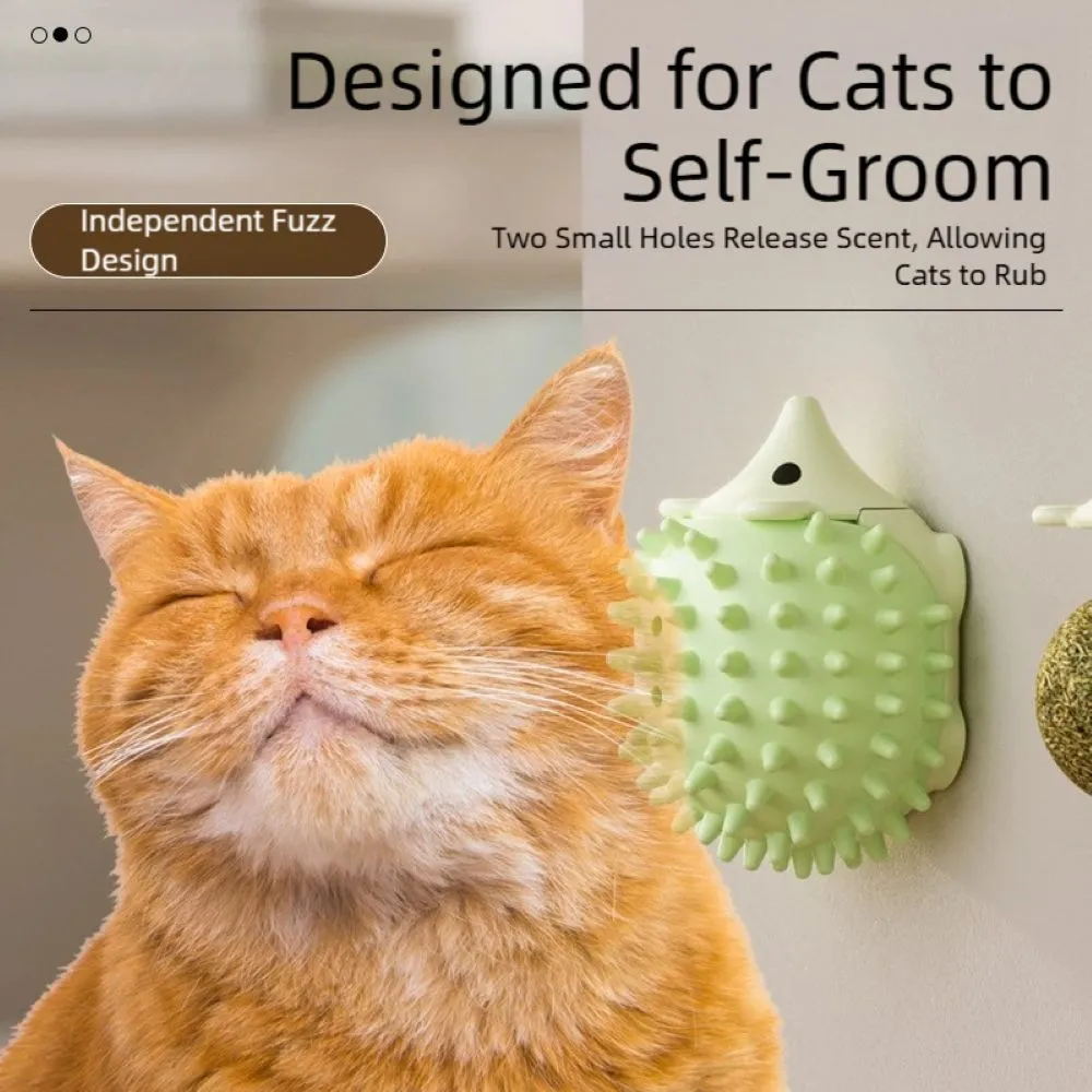 cat-self-groomer-wall-toy-in-use Cat rubbing against wall mounted catnip ball self groomer.