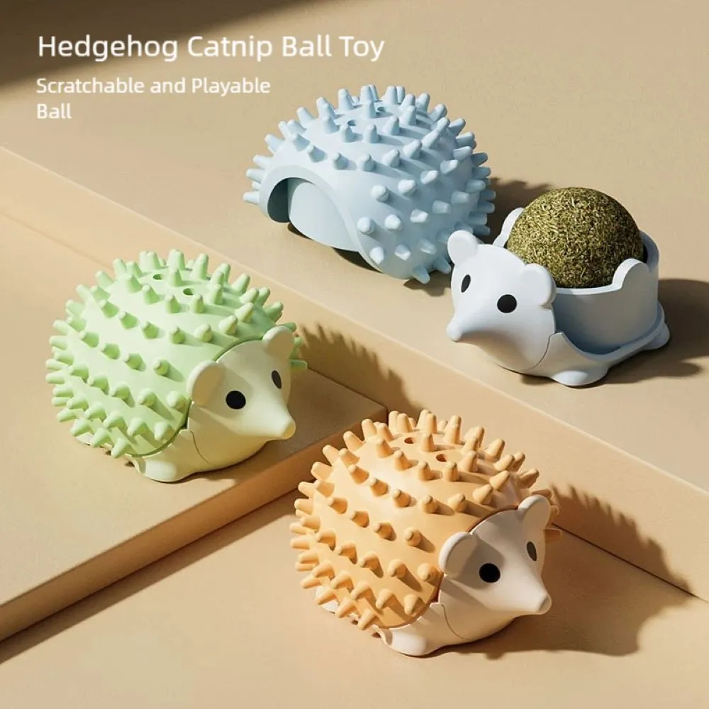 catnip-ball-self-groomer-colours Catnip ball self groomer toys in brown green and blue.